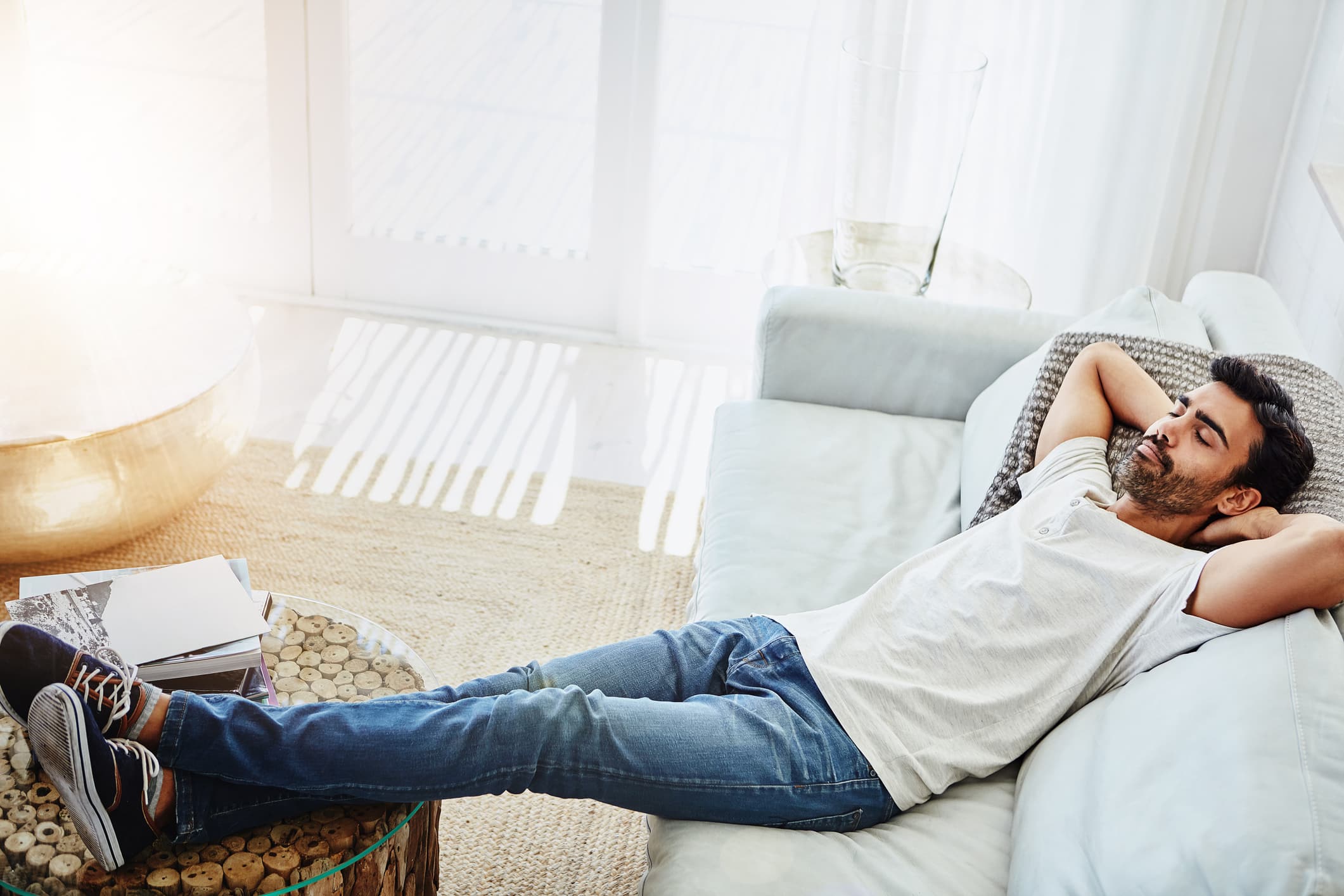 Shot of a man relaxing on the sofa at home