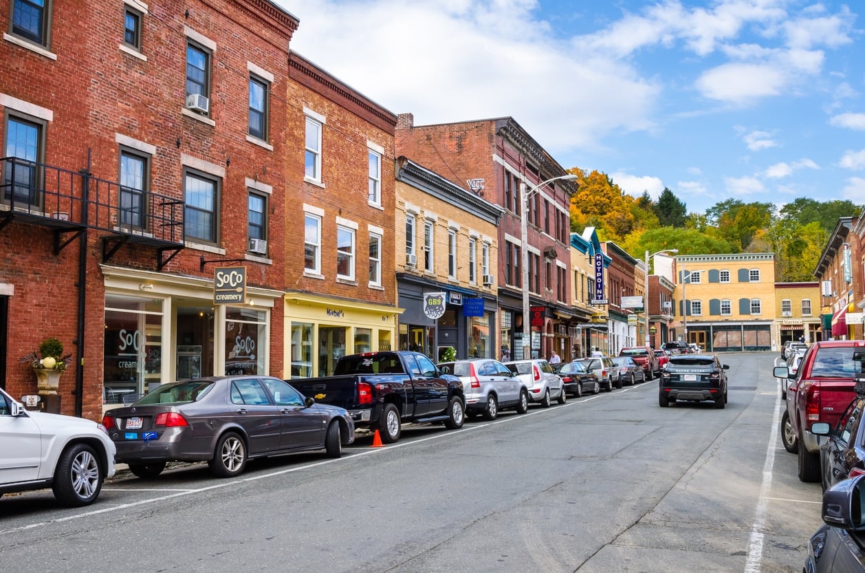 Great Barrington, MA - October 17, 2016: Traditional Brick Buildings with Colourful Shops and Restaurants along Railroad Street. Great Barrington, located within the valley of the Housatonic River, is both a summer resort and home to Ski Butternut.