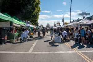 Crowded Farmers Market during a sunny day in southern California.