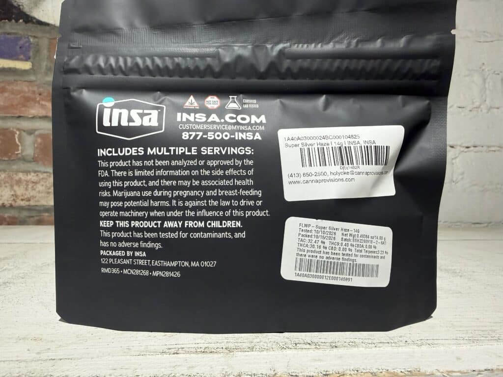 Massachusetts cannabis label guide showing sample THC, TAC and terpene metrics on a flower package.